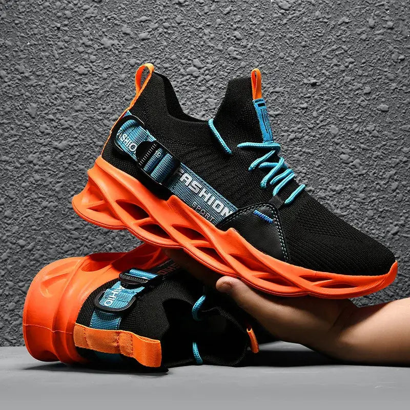 Fendira unisex sneakers with black upper and bright orange sole, featuring light blue accents