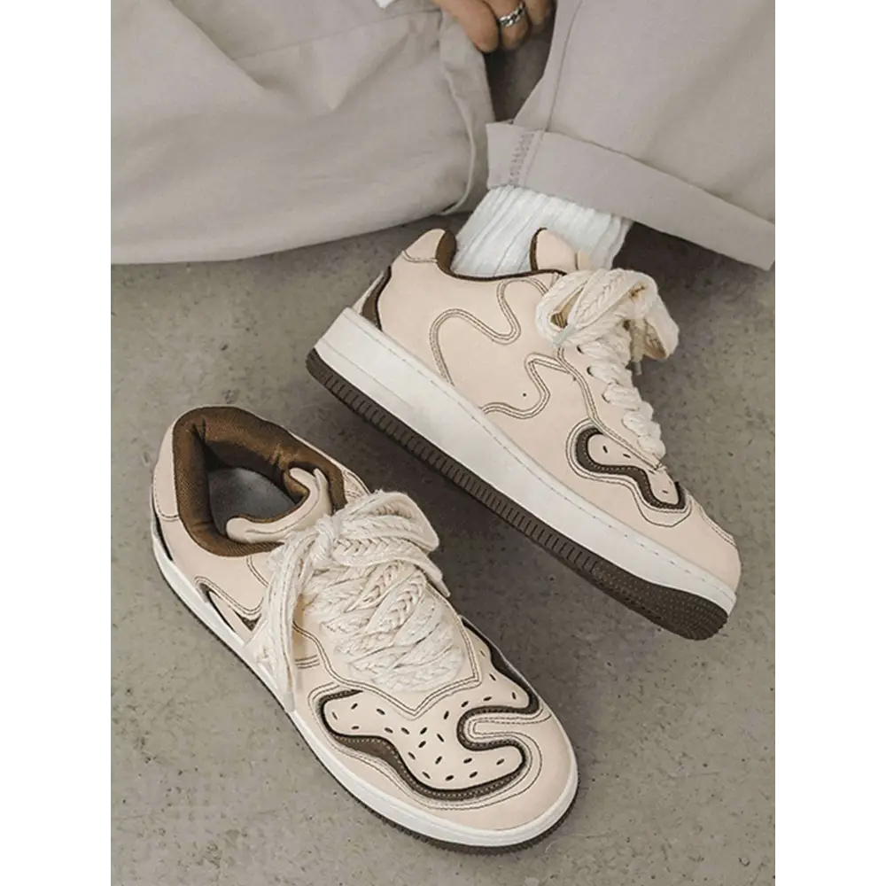 Janor unisex sneakers in cream with brown accents and white laces, stylish design
