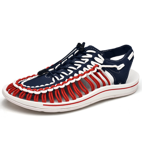 Navy blue Dornis unisex sandalet with red and white woven design