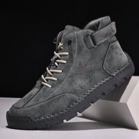 Gray suede Palisco erkek bot with lace-up front and textured sole for stylish comfort