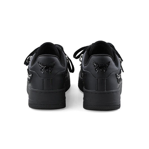 Kelvor unisex siyah sneakers with skull designs on the heels