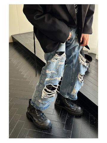 Jardis heavily distressed blue jeans with large rips, perfect for siyah unisex style