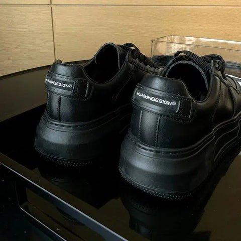 Veldin unisex sneakers in black leather with WANGSNEAKERS branding detail