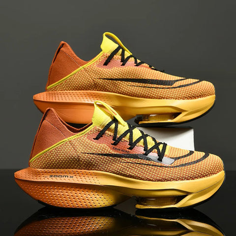 Terion sneakers in orange and yellow with unique curved sole design