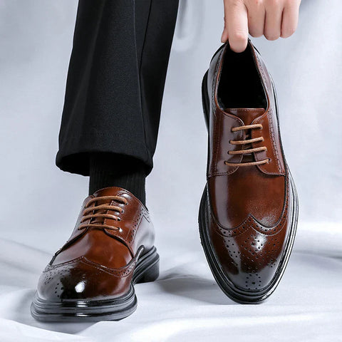 Polished brown leather wingtip dress shoes by Melcor, ideal rugan erkek ayakkabı