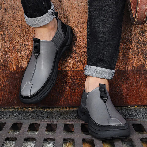 Gray Sorlin günlük ayakkabı with black soles and distinctive front seam