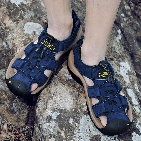 Navy blue Dalron unisex sandalet with adjustable straps worn outdoors