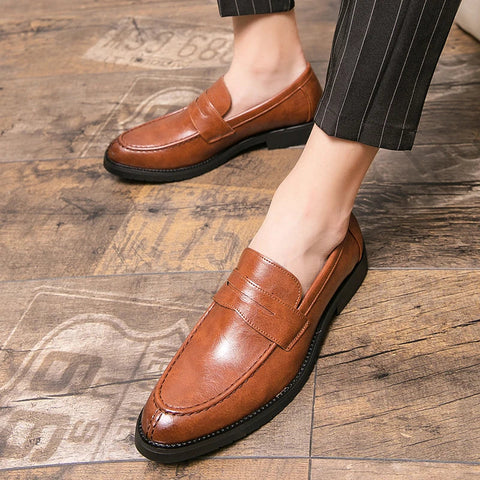 Brown leather penny loafers with pinstriped trousers, ideal for Feldor günlük ayakkabı