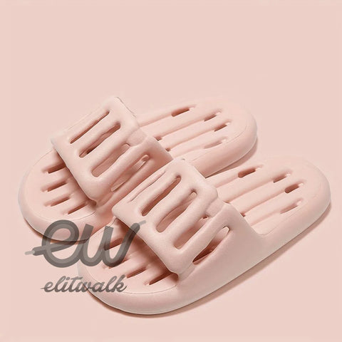 Pale pink Eva kadın terlik with drainage holes, perfect for casual wear