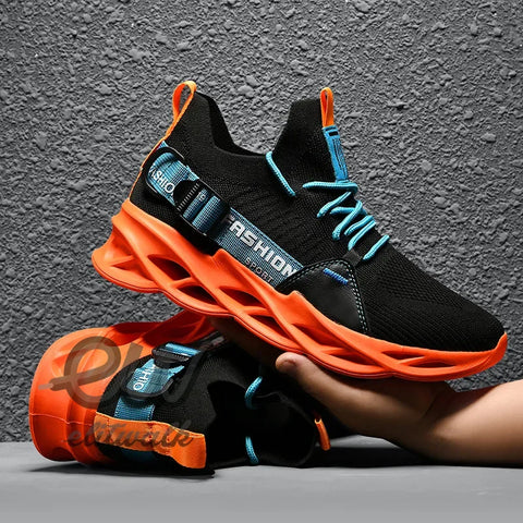 Fendira unisex sneakers with black upper and bright orange sole, featuring light blue accents