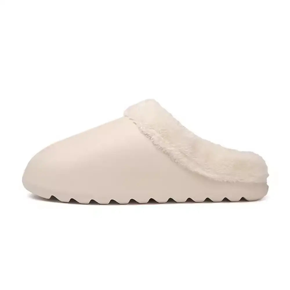 Bej slip-on lorik unisex terlik, dokulu taban ve tüylü astarla tasarlanmıştır