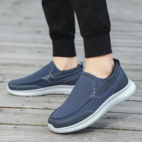 Navy mavi Muriel erkek günlük ayakkabı, beyaz tabanlı kanvas slip-on