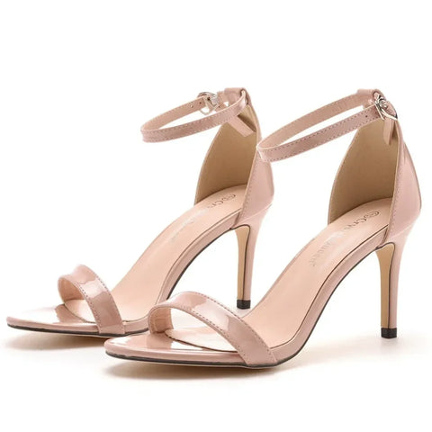 Pale pink Norel kadın topuklu sandalet with ankle straps for stylish elegance