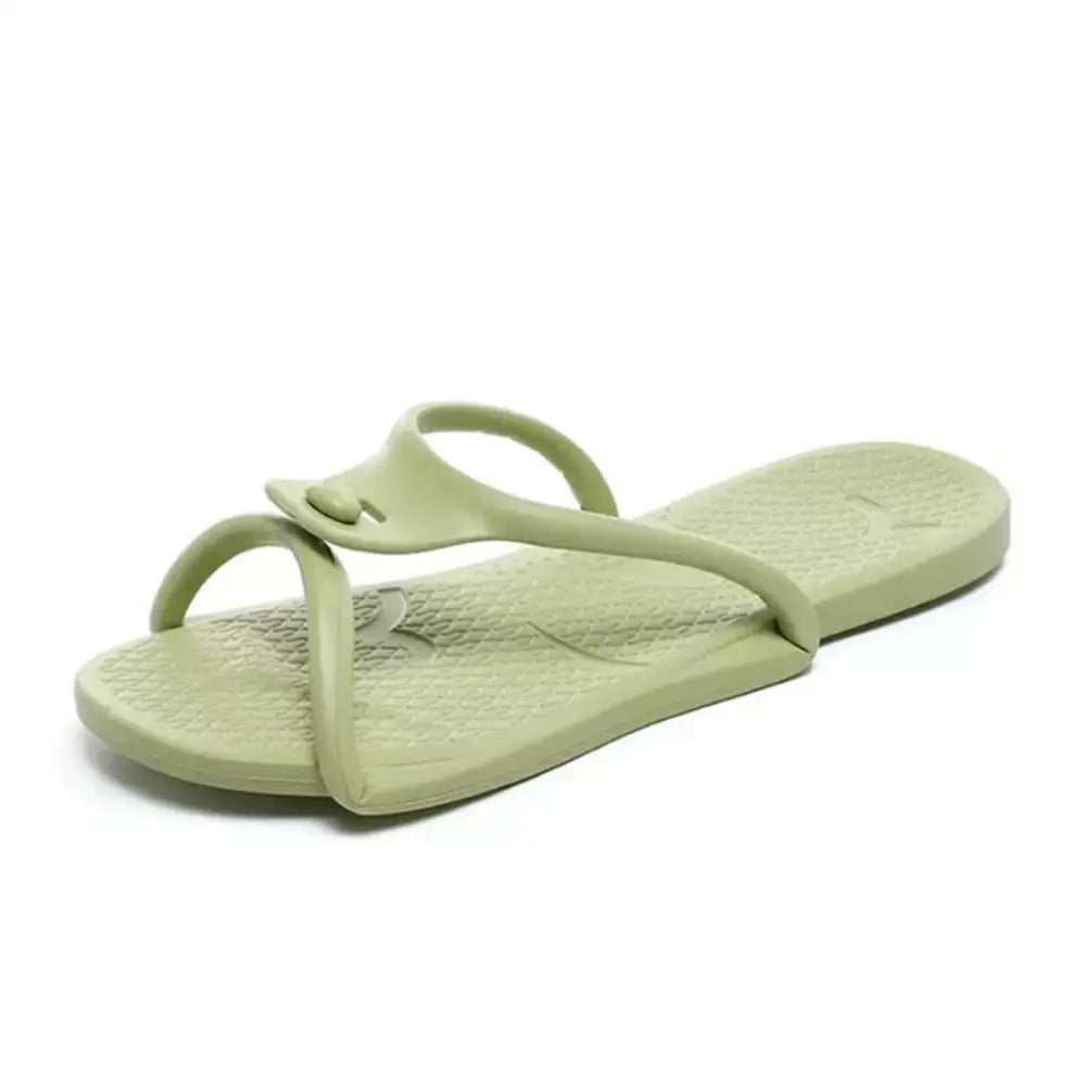 Açık yeşil Sovik unisex terlik, sade thong tasarımıyla şıklık sunmaktadır