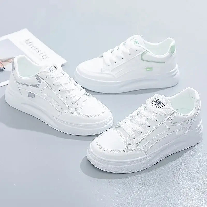 Vellina kadın sneakers, beyaz ayakkabılar mint yeşil detaylarla şık bir görünüm sunuyor