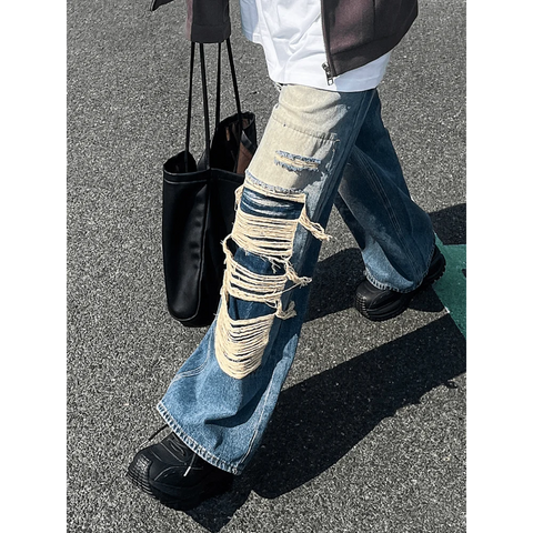 Veslin erkek heavily distressed mavi jeans with rips and fraying for modern style